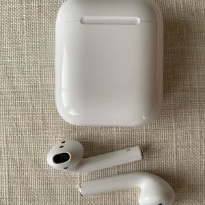 Apple AirPods + Charging Case